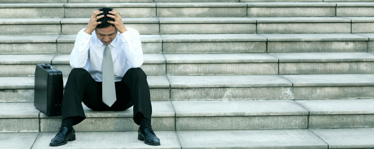 man in suit frustrated